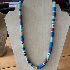 Handmade African vinyl beaded necklace.